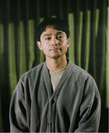 A person in a robe</p>
<p>AI-generated content may be incorrect.