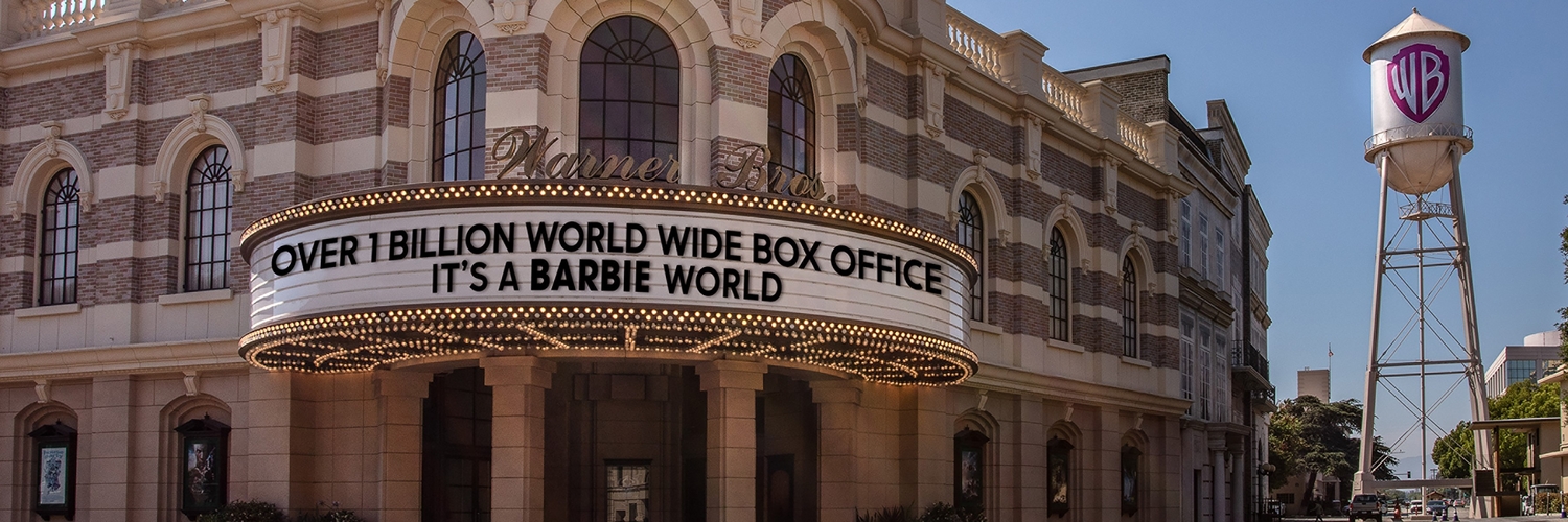 “Barbie” Passes a Billion Dollars Worldwide at the Box Office - photo of a movie theatre marquee displaying the message, "OVER 1 BILLION WORLD WIDE BOX OFFICE.  IT'S A BARBIE WORLD."