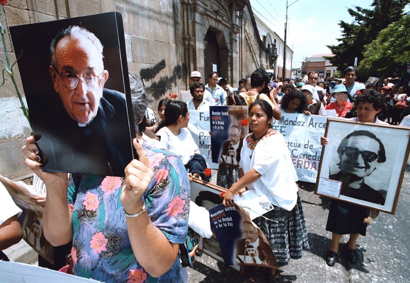 Protestors march against the assassination of Bishop Gerardi