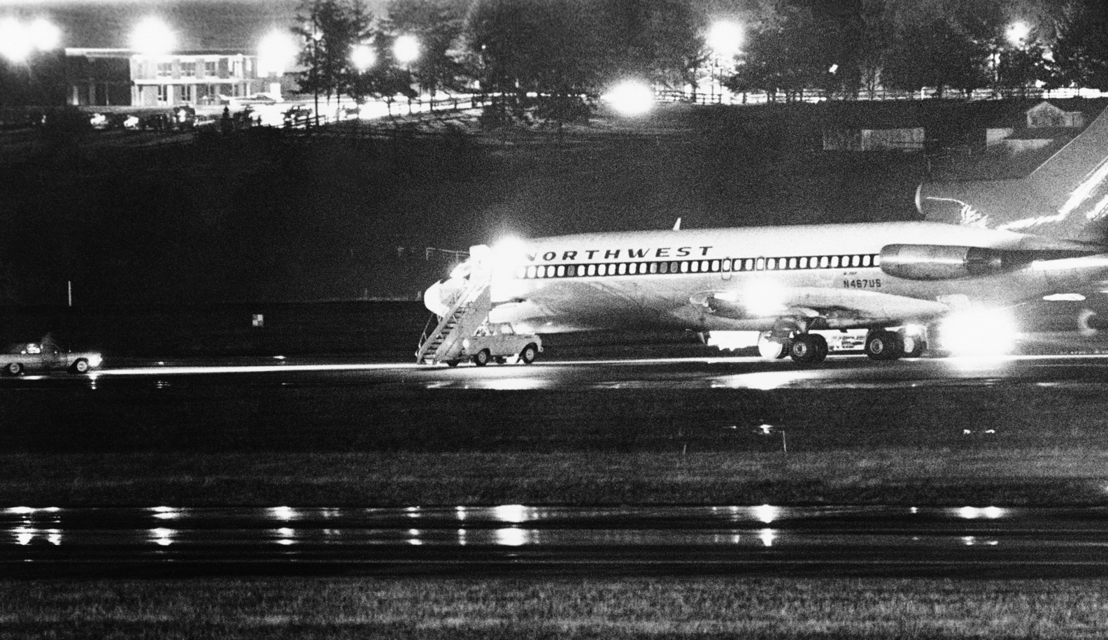 The hijacked Northwest Airlines jetliner 727 sits on a runway for refueling at Tacoma International Airport, Seattle, Washington (Nov. 25, 1971).