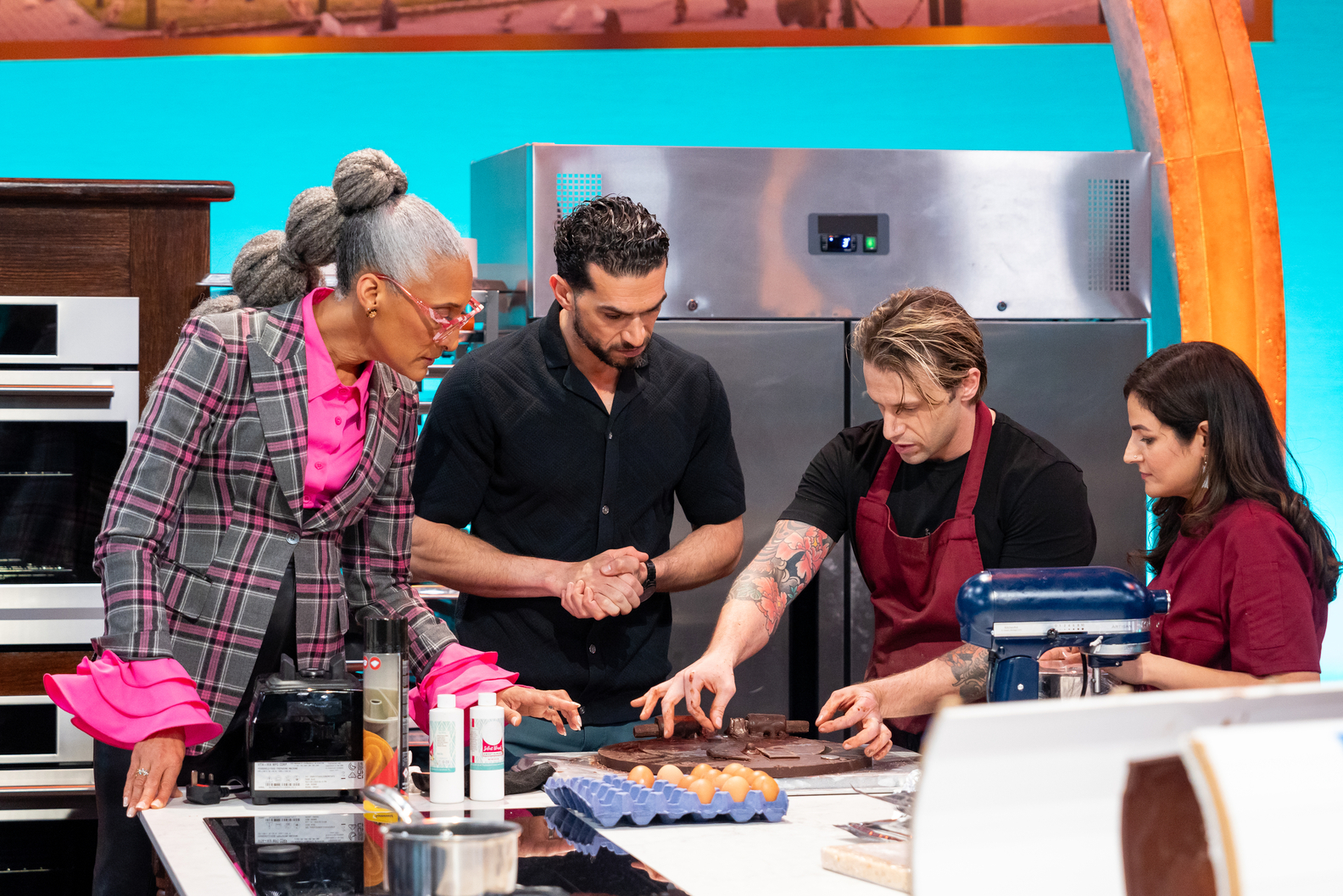 Judges Carla Hall and Jozef Youssef observe competitors