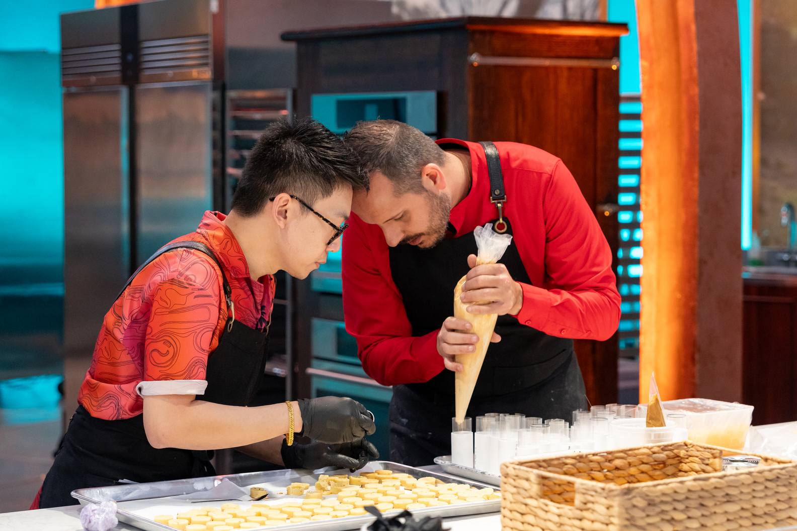 Competitors pipe their showpiece Food Network Harry Potter Wizards of Baking