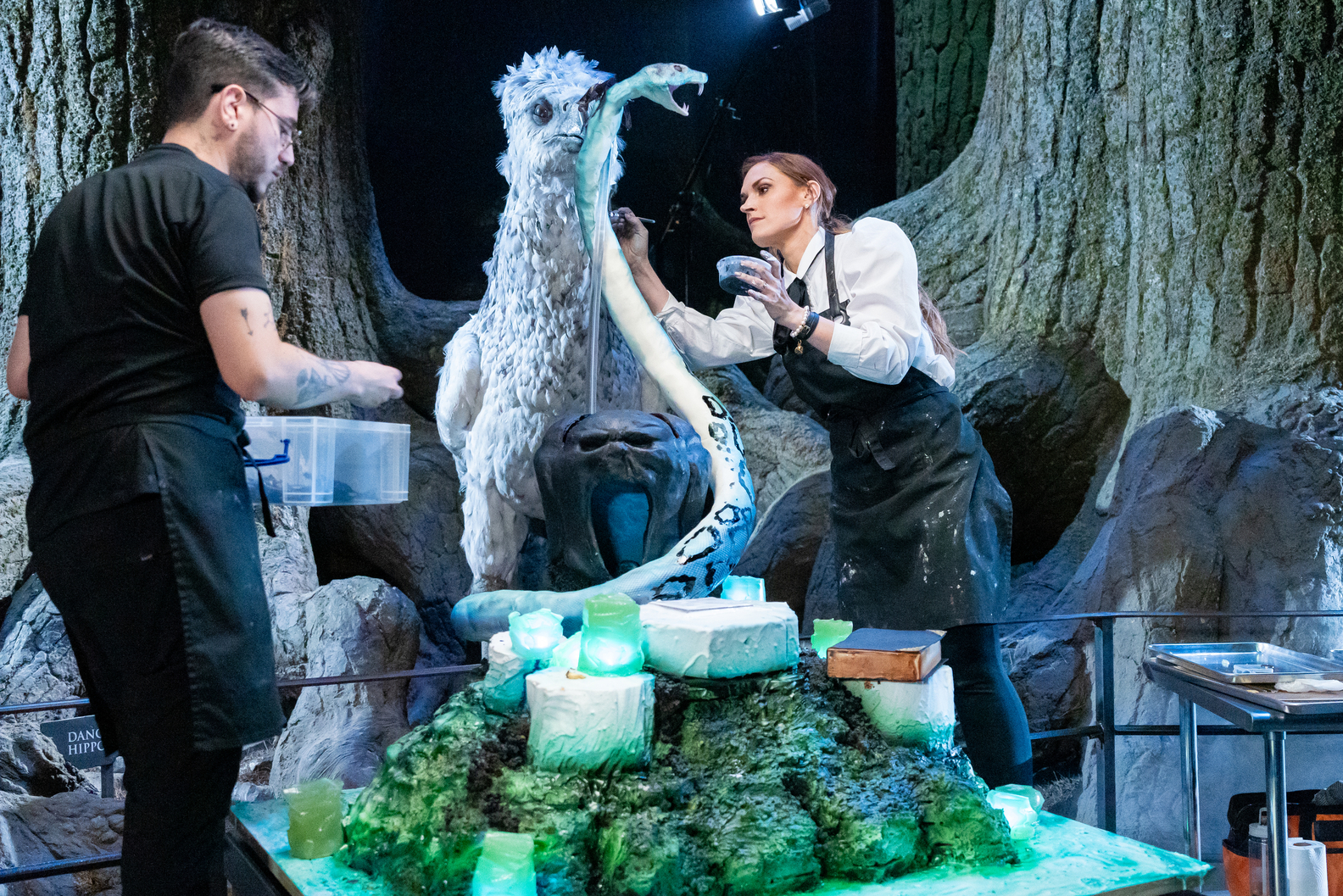 Competitors touch up their showpiece in The Forbidden Forest Food Network Harry Potter Wizards of Baking