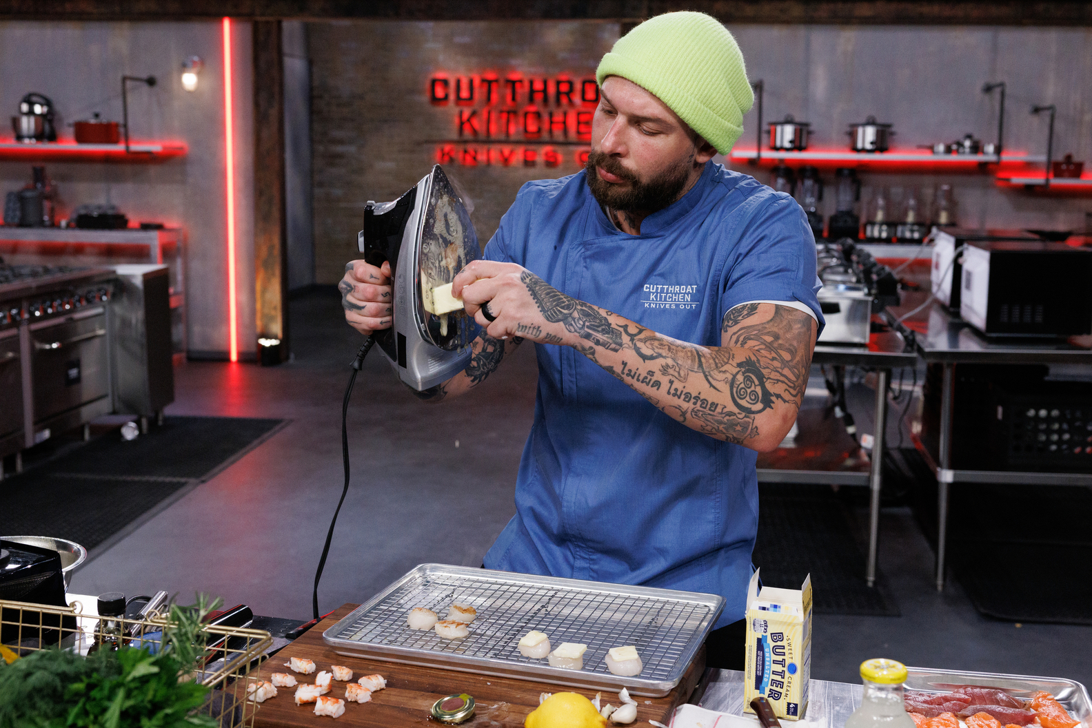 Chef Zev Bennett uses a clothing iron as his heat source as seen on Food Network's Cutthroat Kitchen Knives Out