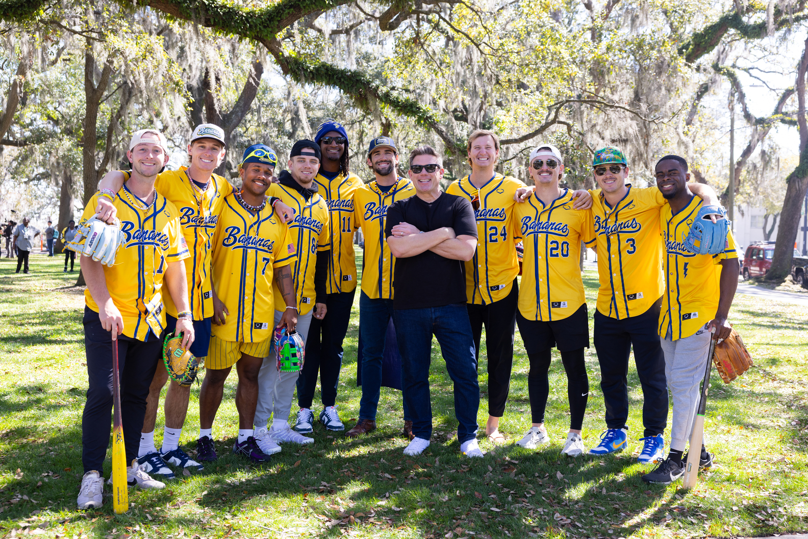 Host Tyler Florence and members of the Savannah Bananas baseball team