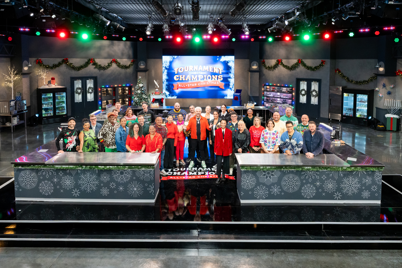 Host Guy Fieri and the cast of Tournament of Champions/ All- Star Christmas. Courtesy of Food Network.