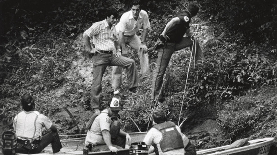Police searching the Chattahoochee River after discovering the body of Nathaniel Cater 