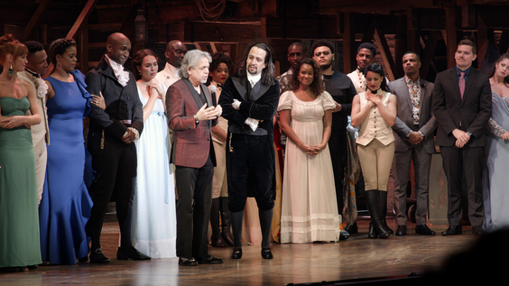 Luis Miranda (center left), on stage with his son Lin-Manuel Miranda (center right) after Hamilton debuted in Puerto Rico