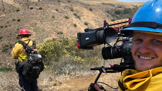 Director Michael Milano with a firefighter in Ojai