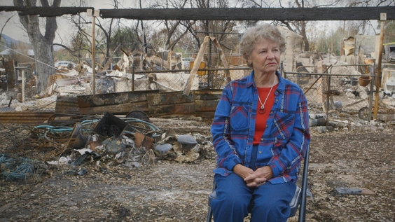 Leona Mote, Upper Ojai resident in front of the remains of her house