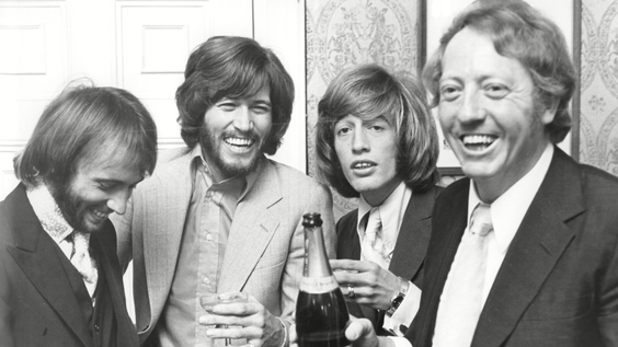 Maurice Gibb, Barry Gibb, Robin Gibb, Robert Stigwood (1970)