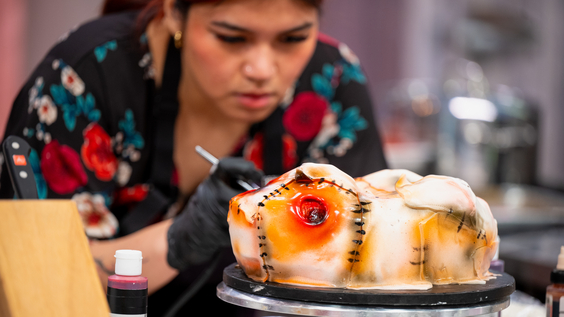 Halloween Baking Championship - Competitor gets going on their creation