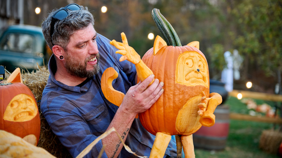 Outrageous Pumpkins - Contestant Titus Arensberg working on a creation