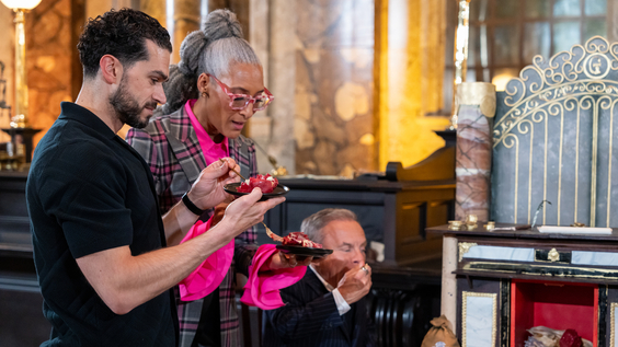 Judges Carla Hall and Jozef Youssef with guest judge Warwick Davis during judging, on Food Network's Harry Potter Wizards of Baking