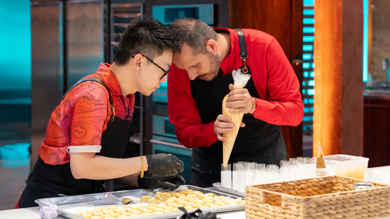 Competitors pipe their showpiece Food Network Harry Potter Wizards of Baking