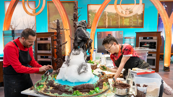 Competitors work on assembling their creation Harry Potter Wizards of Baking Food Network