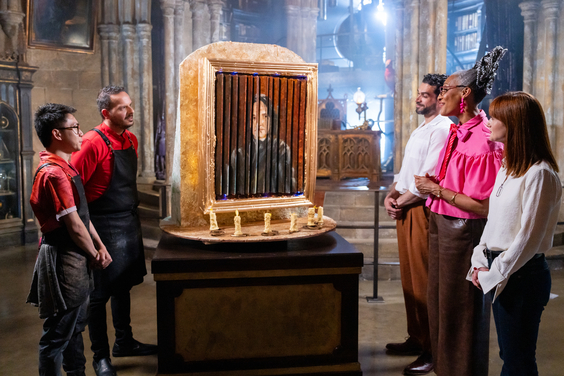 Judges Carla Hall, Jozef Youssef and special guest Bonnie Wright deliver feedback to competitors in Dumbledore's Office 