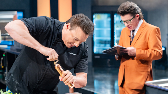 Rocco DiSpirito gets cooking as sideline reporter Justin Warner takes notes on Food Network's Tournament of Champions VI