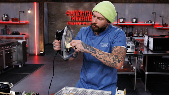 Chef Zev Bennett uses a clothing iron as his heat source as seen on Food Network's Cutthroat Kitchen Knives Out