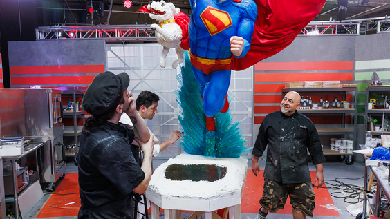 Duff Goldman and his team building Superman cake on Super Mega Cakes