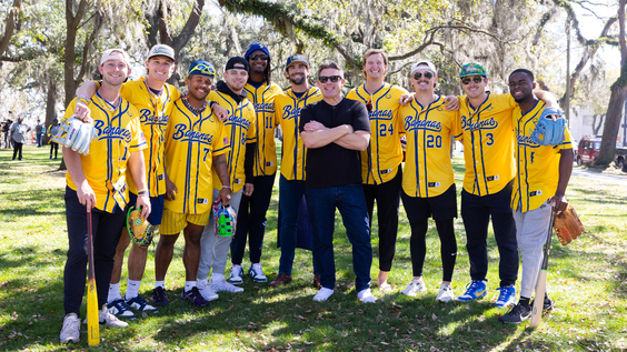 Host Tyler Florence and members of the Savannah Bananas baseball team