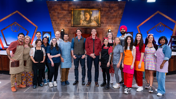 Hosts James Phelps and Oliver Phelps with the competitors on Food Network's Harry Potter Wizards of Baking
