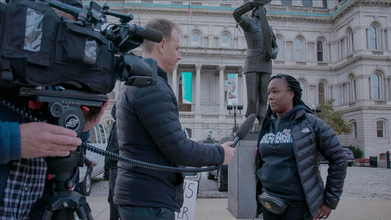 Nicole Suiter being interviewed by news outlets
