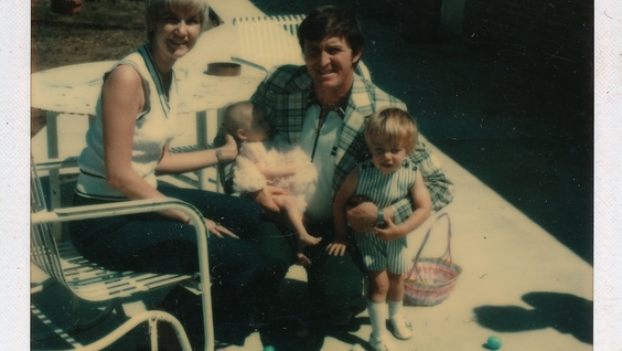 Polaroid of Gary (center) with his family