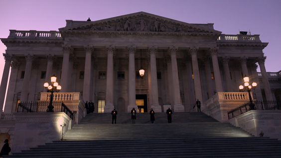 Nancy Pelosi (third from left) at a vigil at the United States House of Representatives in memory of 400,000 Covid-19 deaths