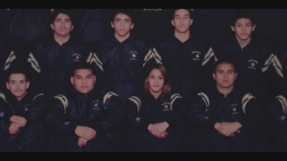Tatiana Suarez (center) on her high school wrestling team