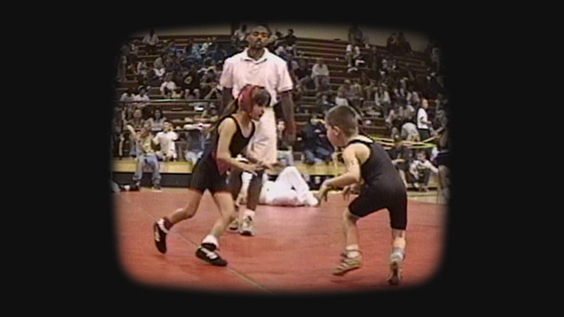 Tatiana Suarez (left) wrestling as a kid
