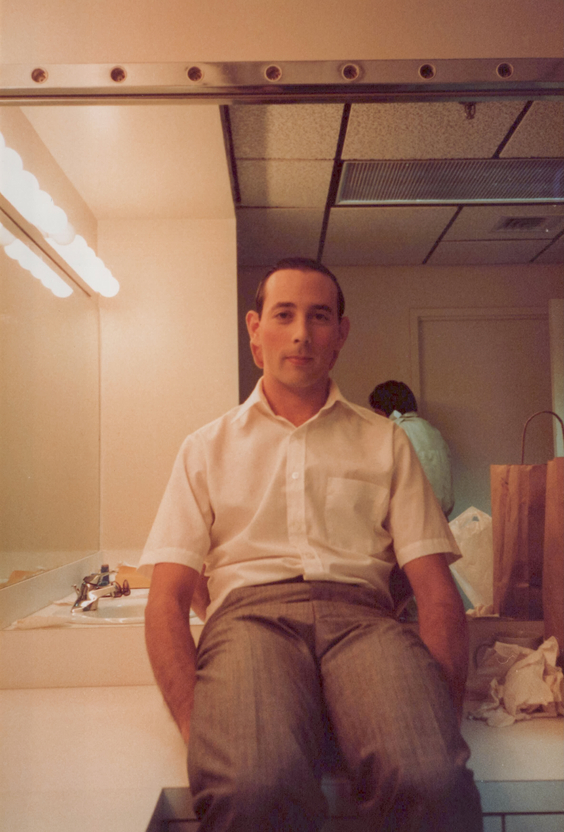 Paul in dressing room half in Pee-wee costume