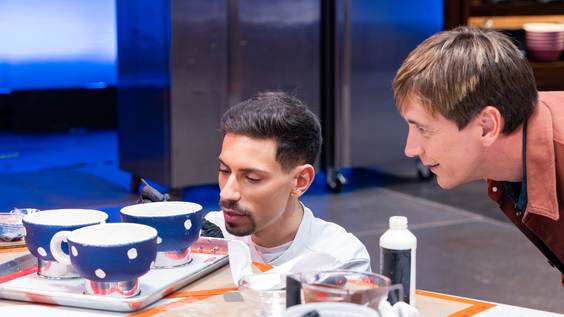 Host Oliver Phelps with contestant Rui Mota