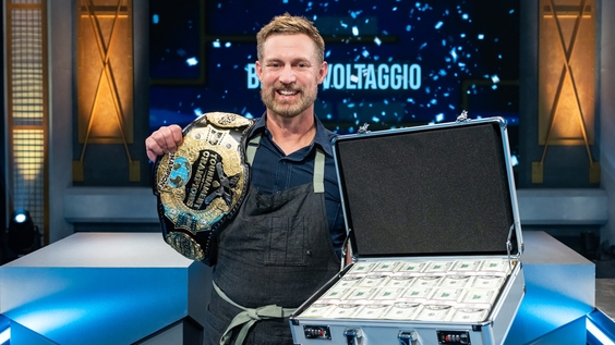 Winning contestant Bryan Voltaggio with prize money and belt, as seen on Tournament of Champions, Season VII
